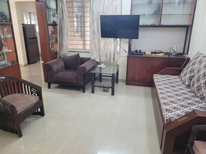 Living Room in 2 BHK Apartment at Sharad Vaibhav, Model Colony – for Rent