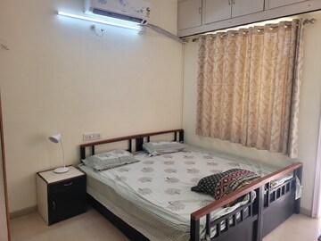 Bedroom in 2 BHK Apartment at Sharad Vaibhav, Model Colony – for Rent