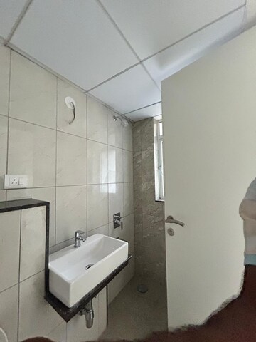 Bathroom in 2 BHK Apartment at Shapoorji Pallonji Sensorium Prisma, Hinjewadi – for Rent