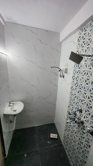 Bathroom in 1 BHK Apartment at Rajaram Sukur Sapphire, Ghodbunder Road – for Rent