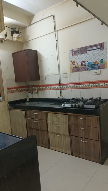 Kitchen in 3 BHK Apartment at Lodha Paradise, Majiwada – for Rent