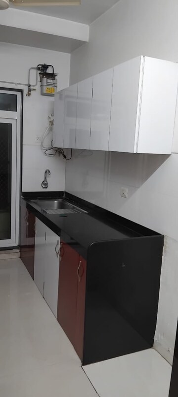 Kitchen in 3 BHK Apartment at Rustomjee Azziano Wing D, Thane West – for Rent
