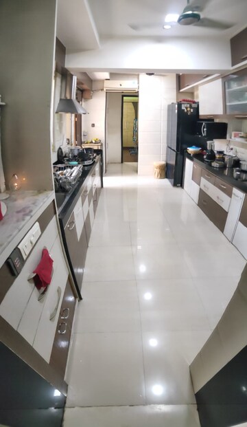 Kitchen in 4 BHK Apartment at Lodha Luxuria, Majiwada – for Sale