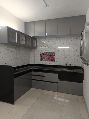 Kitchen in 2 BHK Apartment at Spring Glory Co-Operative Society, Kharadi – for Rent