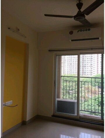 Room in 2 BHK Apartment at Rustomjee Urbania Atelier, Thane West – for Sale