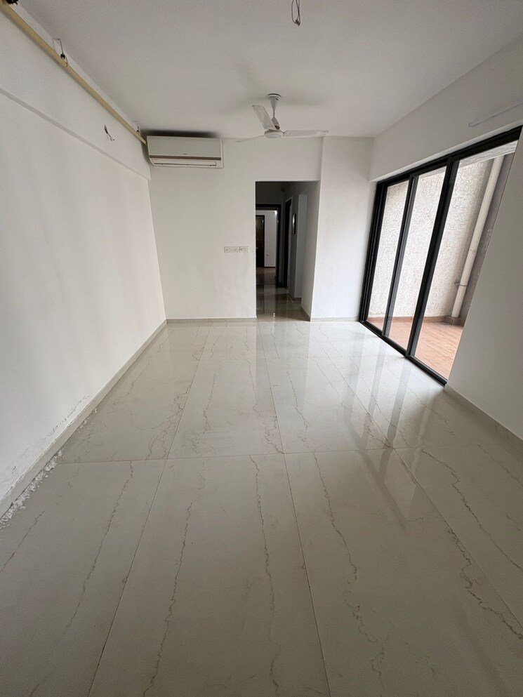 Living Room, lodha-lakeshore-greens 2 Bedroom 738 Sq.Ft. Apartment In Hedutane Thane 9295784