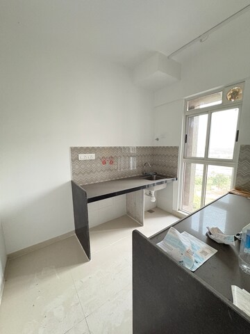 Kitchen in 2 BHK Apartment at Lodha Codename Premier, Mangaon – for Sale