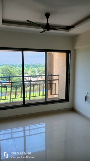 Living Room in 2 BHK Apartment at Viva City, Virar West – for Sale