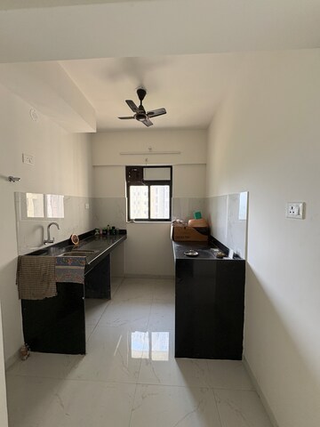 Kitchen in 1 BHK Apartment at Runwal Gardens, Bhadra Nagar – for Sale