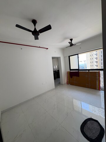 Living Room in 1 BHK Apartment at Runwal Gardens, Bhadra Nagar – for Sale