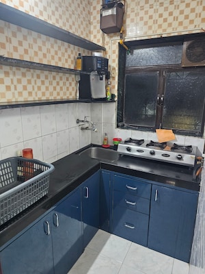 Kitchen in 1 BHK Apartment at Mahesh CHS Gograswadi, Dombivli East – for Sale