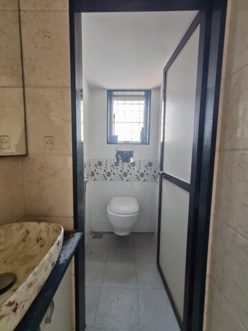 Bathroom in 1 BHK Apartment at Devta CHS, Kharigaon – for Rent