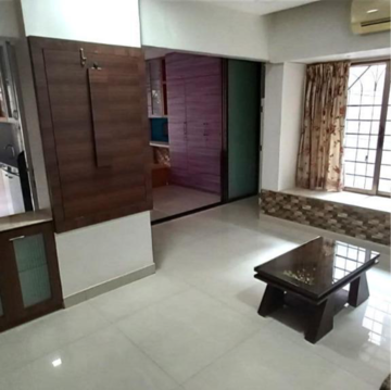 Living Room in 2 BHK Apartment at Landmark Building Bandra West, Carter Road – for Rent
