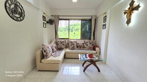 Living Room in 1 BHK Apartment at Rishikesh CHS, Malad West – for Sale