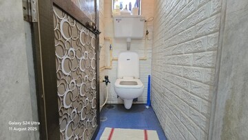 Bathroom in 1 BHK Apartment at Rishikesh CHS, Malad West – for Sale