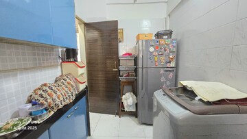 Kitchen in 1 BHK Apartment at Rishikesh CHS, Malad West – for Sale