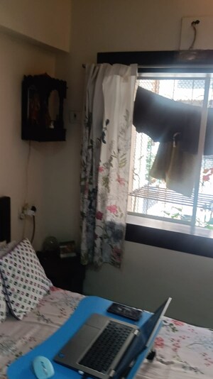 Living Room in 1 BHK Apartment at K Raheja Palm Court, Malad West – for Rent