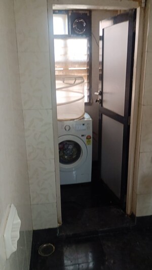 Bathroom in 1 BHK Apartment at K Raheja Palm Court, Malad West – for Rent