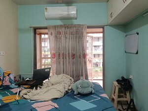 Bedroom in 2 BHK Apartment at Raviraj Park Island, Yerawada – for Rent