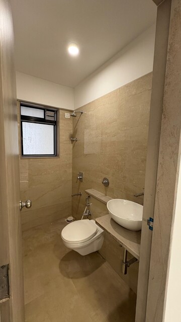 Bathroom in 2 BHK Apartment at Sadguru Dhaval CHS, Malad West – for Rent