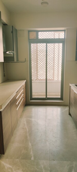 Kitchen in 2 BHK Apartment at Piramal Vaikunth, Balkum Pada – for Rent