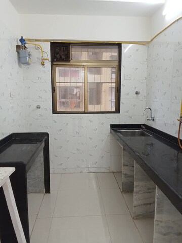 Kitchen in 2 BHK Apartment at Chandak Nishchay, Borivali East – for Sale