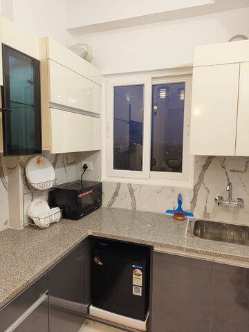Kitchen in 1 BHK Apartment at Purvanchal Royal City, Chi V Greater Noida – for Rent