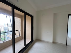 Room in 2 BHK Apartment at Raheja Interface Heights, Malad West – for Sale