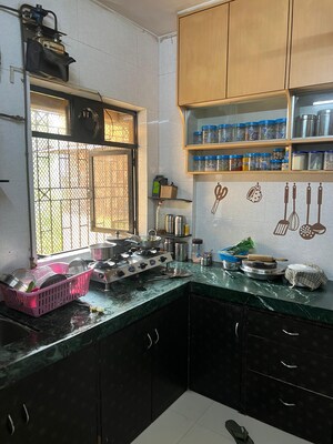 Kitchen in 2 BHK Apartment at Kalpavriksha Garden Co.op.Hsg.Soc.Ltd., Dhokali – for Rent