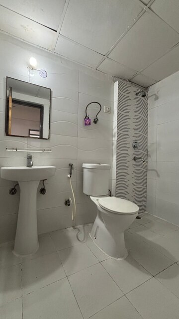 Bathroom in 3 BHK Apartment at Amrapali Zodiac, Sector 120 – for Sale