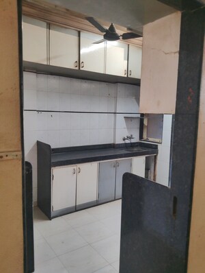 Kitchen in 2 BHK Apartment at Pooja CHS Borivali, Borivali West – for Sale
