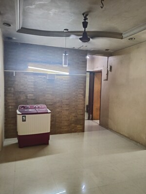 Room in 2 BHK Apartment at Pooja CHS Borivali, Borivali West – for Sale