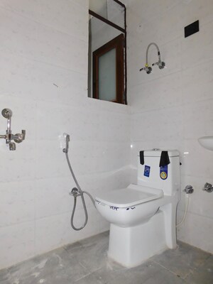 Bathroom in 1 BHK Builder Floor at Chattarpur – for Sale