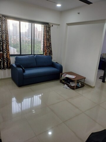 Living Room in 1 BHK Apartment at Highland Pearl, Thane West – for Rent