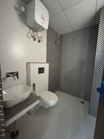 Bathroom in 4 BHK Apartment at Affinity Greens, International Airport Road – for Rent