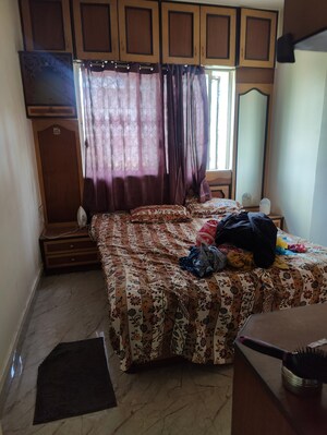 Bedroom in 1 BHK Apartment at Riddhi Enclave Co-op Housing Society Ltd, Viman Nagar – for Rent