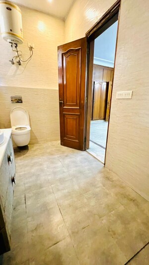 Bathroom in 4 BHK Builder Floor at Uday Park – for Rent