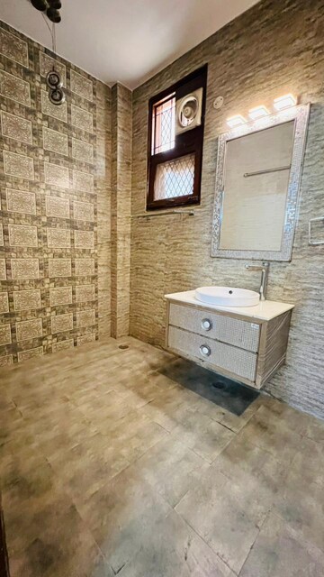 Bathroom in 4 BHK Builder Floor at Uday Park – for Rent