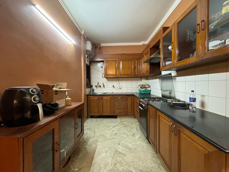 Kitchen, east of kailash 3 Bedroom 200 Sq.Yd. Builder Floor In East Of Kailash Delhi 9296791