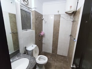 Bathroom in 3 BHK Builder Floor at Ansal API Esencia, Sector 67 – for Sale
