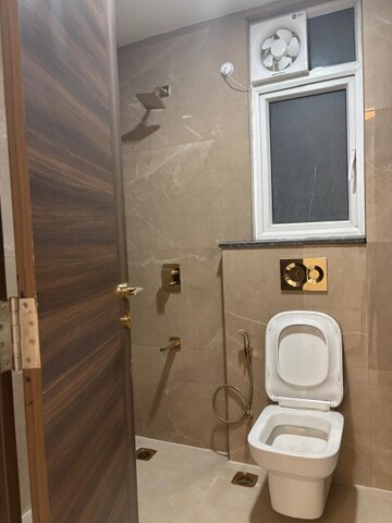 Bathroom in 3 BHK Apartment at Smart World Orchard, Sector 61 – for Rent