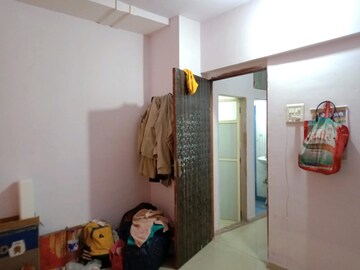 Living Room in 1 BHK Apartment at Reliable Garden, Naigaon East – for Rent