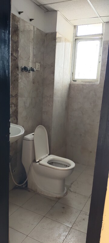 Bathroom in 1 BHK Apartment at AVJ Heightss, Zeta I Greater Noida – for Sale