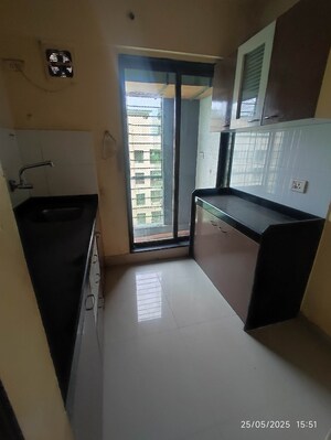 Kitchen in 2 BHK Apartment at Bhoomi Acropolis, Virar West – for Rent