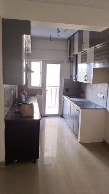 Kitchen in 2.5 BHK Apartment at Saviour Park, Mohan Nagar – for Rent