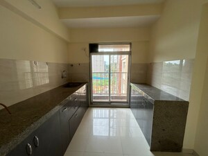 Kitchen in 1 BHK Apartment at Squarefeet Imperial Square, Ghodbunder Road – for Rent