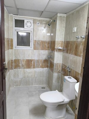 Bathroom in 2 BHK Apartment at AIMS Golf Town, Sector 4 Greater Noida – for Rent