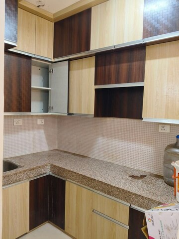 Kitchen in 2 BHK Apartment at AIMS Golf Town, Sector 4 Greater Noida – for Rent
