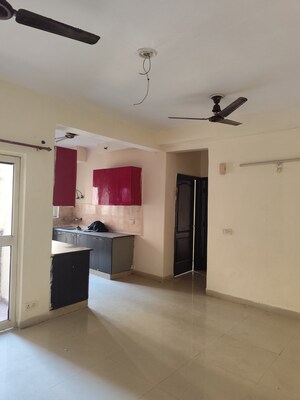 Living Room in 2 BHK Apartment at Aims Golf City, Sector 75 – for Rent