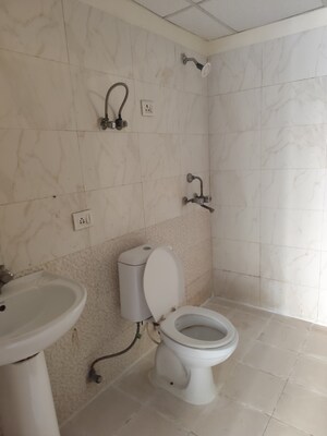 Bathroom in 2 BHK Apartment at Aims Golf City, Sector 75 – for Rent